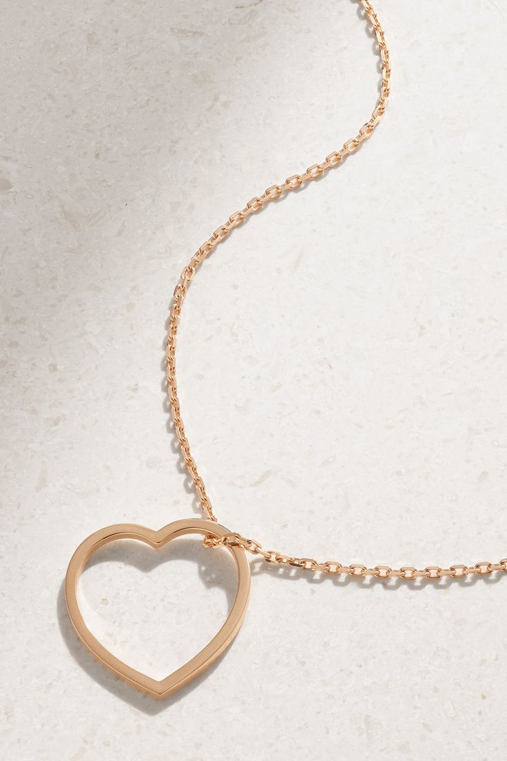 Repossi's necklace is part of the label's 'Antifer' collection named after Normandy's breath-taking cliffs. It's cast from 18-karat rose gold and strung with a sweet heart pendant, which can be removed and styled as a ring too. Delicate Tarnish Resistant Heart Pendant Necklace, 14k Rose Gold Necklace With Heart Charm, Fine Jewelry Rose Gold Necklace With Heart Charm, Rose Gold Heart Charm Fine Necklace, Rose Gold Fine Jewelry Necklaces With Heart Charm, Rose Gold Heart Pendant Necklace Fine Jewelry, Rose Gold Double Heart Necklace With Delicate Chain, 14k Gold Clavicle Chain Necklace For Valentine's Day, Rose Gold Heart Necklace With Clavicle Chain