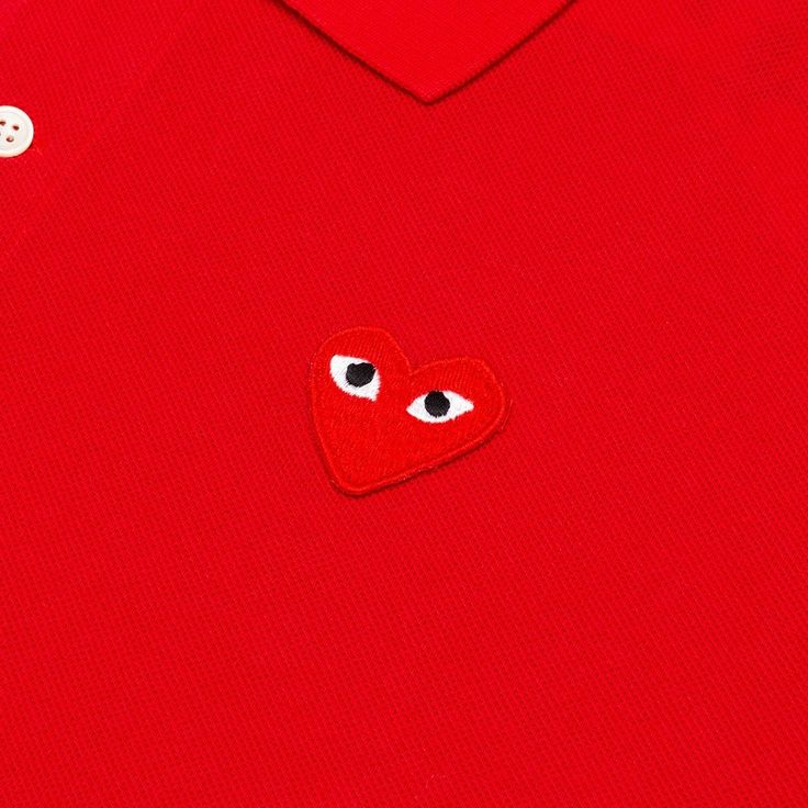 The concept of the Comme des Garcons PLAY line is design by not designing. Characterized by the iconic red heart logo designed by artist Filip Pagowski, the line is a collection of unisex basics, fragrances, and footwear for those who enjoy simplicity. Pictured is the Comme des Garcons PLAY Polo Shirt in Red. AZ T006 051 4 COMME DES GARCONS PLAY APPAREL HAS A SMALLER FIT, WE RECOMMEND SIZING UP. Button closure Embroidered CDG heart logo Style No: AZ-T006-051-4 condition: new Cdg Heart, Logo Style, Air Jordan 3 Retro, Comme Des Garcons Play, Heart Logo, Air Jordan 3, Fashion Logo, Comme Des Garcons, The Line