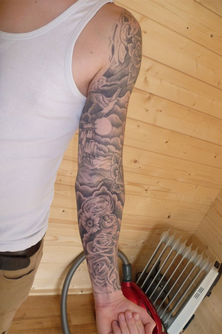 a man with a tattoo on his arm