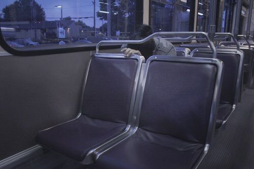 the seats are empty on the bus at night