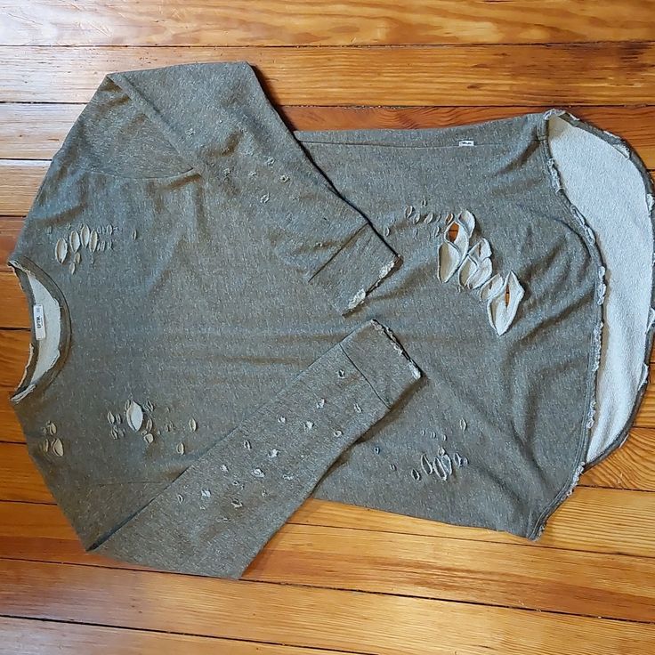 Nwot. Long Sleeve Distressed Thick Shirt/Light Sweater By Eptm. Fun Shirt And Very Comfortable. Color Is Olive Ish. See Pics. Questions Welcomed Distressed Tops For Spring Loungewear, Spring Distressed Tops For Loungewear, Spring Distressed Loungewear Tops, Distressed Long Sleeve Tops For Loungewear, Casual Ripped Sweater For Fall, Casual Cotton Ripped Tops, Distressed Long Sleeve Tops For Fall, Distressed Gray Tops For Fall, Casual Ripped Cotton Top