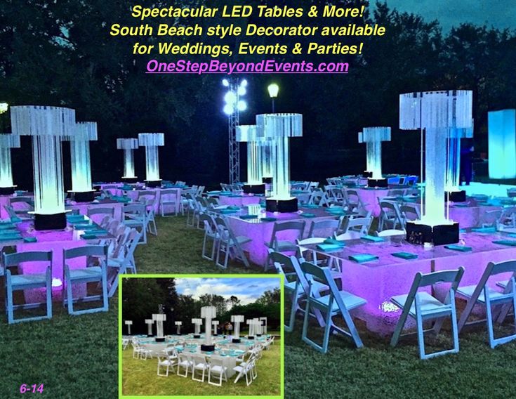 an outdoor event set up with purple and white linens for tables, chairs, and more