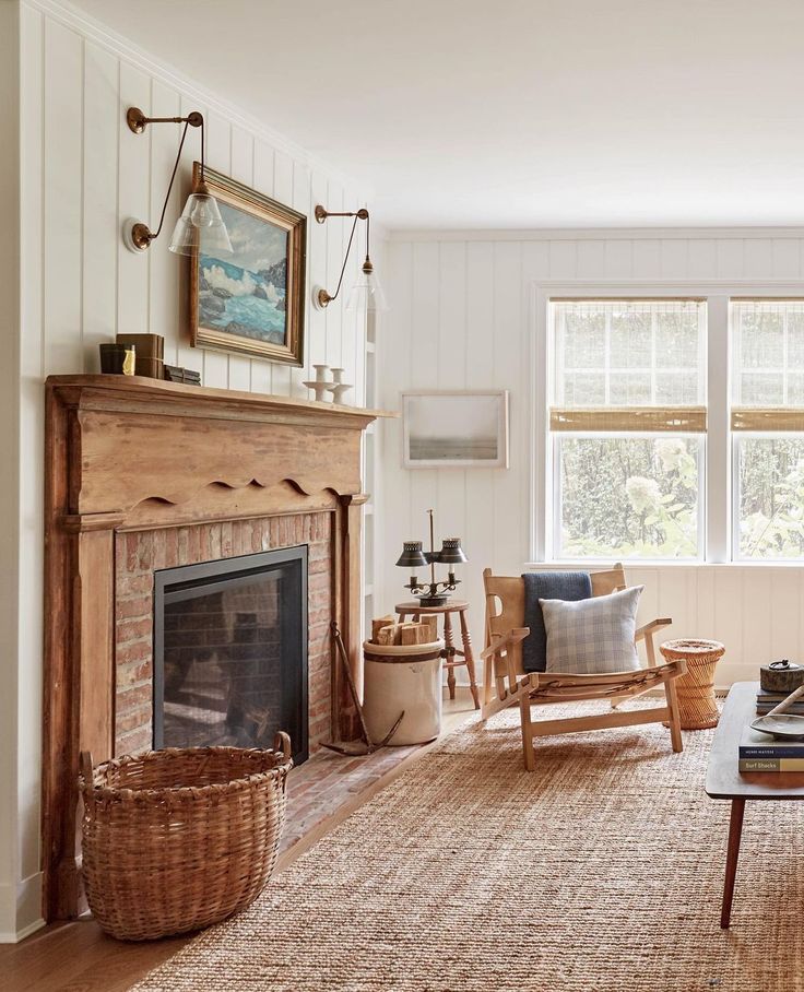 a living room filled with furniture and a fire place