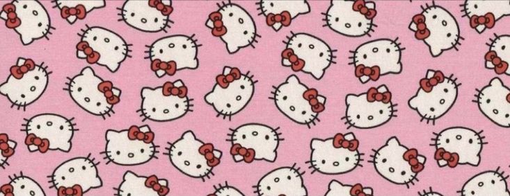 a pink background with hello kitty heads and bows