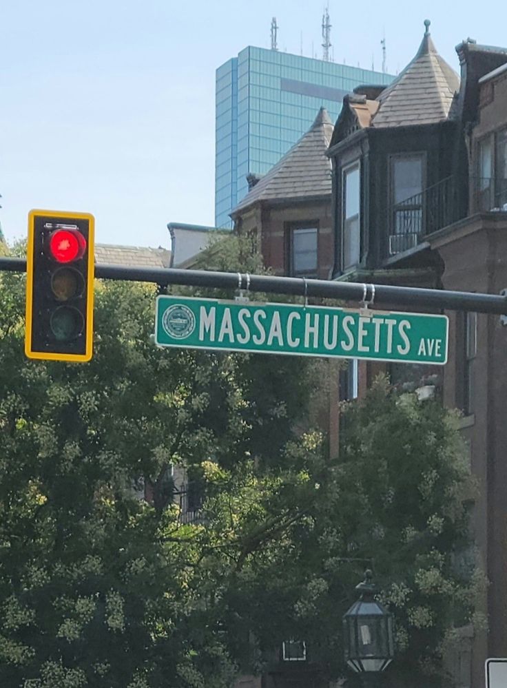 the street sign is clearly visible for us to see in this photo, and it says massachusetts ave