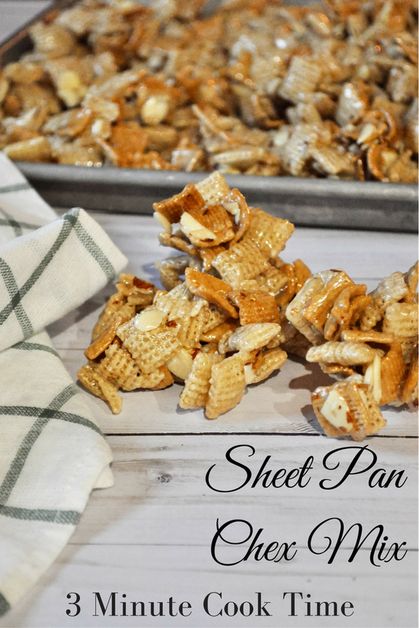 a pile of chex mix sitting on top of a table next to a baking pan