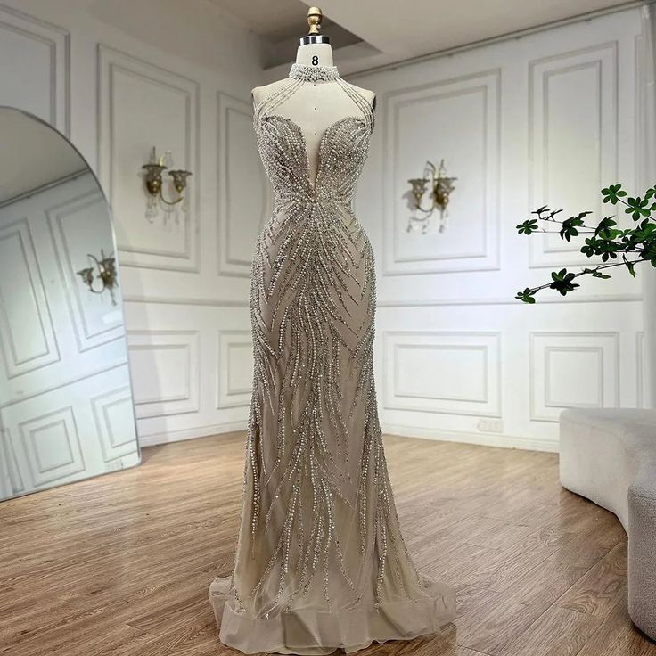 a dress on display in front of a mirror