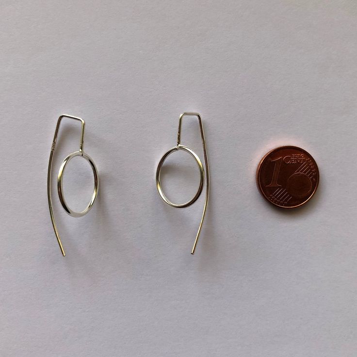 "Silver Long Stem Earrings Karma Circle - Silver Earrings - Karma Circle Earrings - Modern Jewelry - Minimalist Jewelry - Gift Idea for Her \"Do good and good will come to you,\" (Karma Law). Sterling Silver, 925 Weight: 1,7 g Diameter: 1,5 cm (0.59 inches) Length: ~3.5 cm (1.37 inches) Art.: M-48861 Made in Spain For more MOSA designs, please, visit my online store at www.BestSpanishShop.com" Modern Pierced Wrap Earrings As Gift, Minimalist Handmade Dangle Wrap Earrings, Modern Round Wrap Earrings As Gift, Modern Round Wrap Earrings For Gift, Modern Round Cartilage Earrings With Ear Wire, Modern Adjustable Wrap Earrings As Gift, Modern Hypoallergenic Wrap Earrings As Gift, Modern Hypoallergenic Wrap Earrings For Gifts, Handmade Minimalist Dangle Wrap Earrings