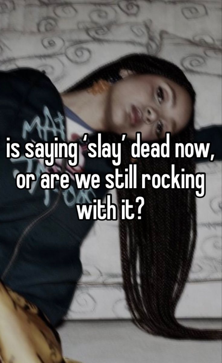 a woman laying on top of a bed next to a pillow with the words is saying,'slay dead now, or are we still rocking with it?