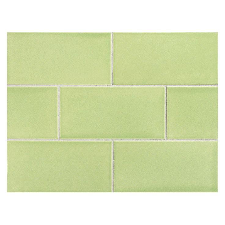 a light green brick wall with white lines