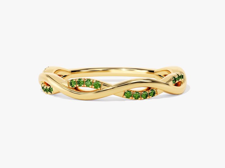 This remarkable ring features a twisted infinity band adorned with a total of 24 vibrant emeralds. Emeralds are known for their stunning green hue and are associated with love, rebirth, and prosperity. They are also believed to symbolize growth and renewal. The infinity symbol within the ring design represents everlasting love, unity, and the enduring connection between two hearts. Elegant Green Stackable Eternity Band, Green Emerald Eternity Band Fine Jewelry, Elegant Green Gemstone Eternity Band, Green Half Eternity Fine Jewelry Band, Elegant Green Eternity Band For May Birthstone, Elegant Green Eternity Band For Anniversary, Formal Green Gemstone Eternity Band, Elegant Green May Birthstone Eternity Band, Green Eternity Band For Anniversary With May Birthstone