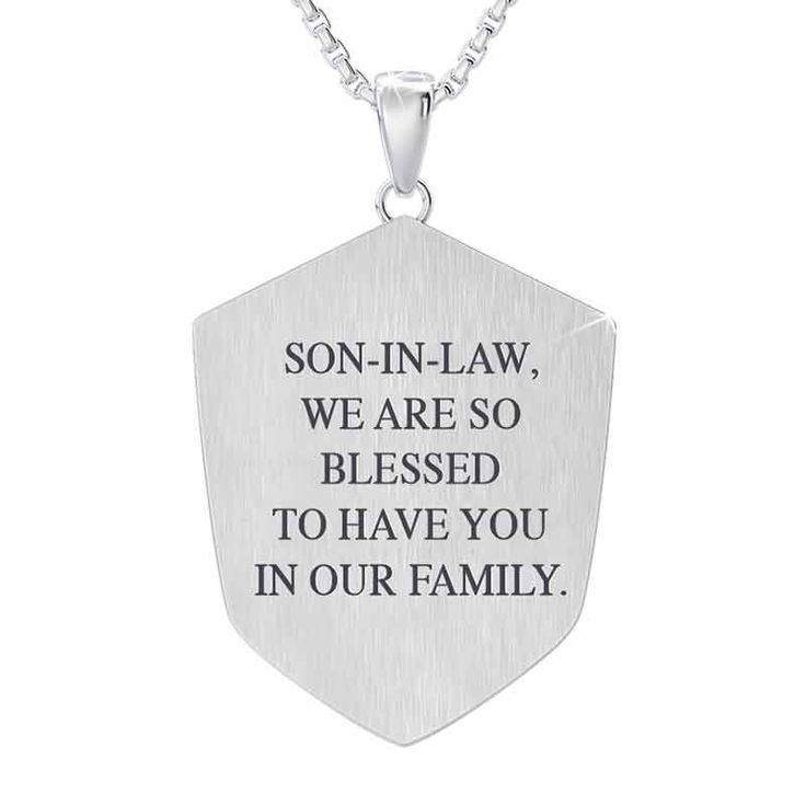 Show your son-in-law how much he means to you with a gift that says it all. A stainless steel pendant accented with striking blue and black enameling.Front features a cross set with a genuine diamond and seven engraved words to inspire your son-in-law every day.The endearing sentiment “Son-in-law, we are so blessed to have you in our family” is inscribed on the reverse to remind him of your love and appreciation.A matching 22-inch stainless steel chain and luxurious presentation pouch, perfect f Black Stainless Steel Jewelry With Engraving Option, Silver Stainless Steel Jewelry With Hallmark, Father's Day Stainless Steel Nameplate Jewelry, Inspirational Silver Jewelry For Father's Day, Father's Day Engraved Keepsake Jewelry, Father's Day Keepsake Engraved Jewelry, Engraved Stainless Steel Dog Tag Jewelry, Black Stainless Steel Jewelry For Memorial, Meaningful Stainless Steel Jewelry For Father's Day