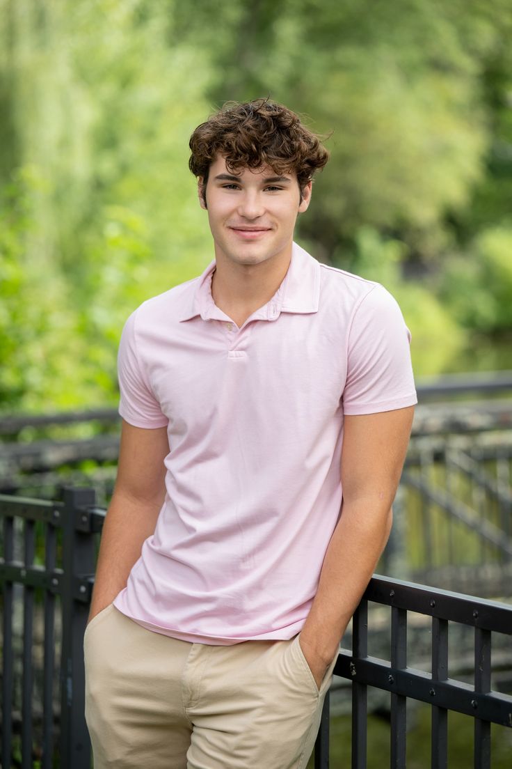 Male high school senior wearing pale pink collared shirt and khaki pants Senior Portrait Outfit Ideas, Portrait Outfit Ideas, Pink Collared Shirt, Senior Portrait Outfits, Senior Photo, High School Senior, Senior Portrait, Collared Shirt, High School Seniors