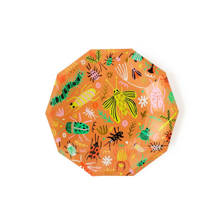 an orange paper plate with colorful bugs and plants on it, against a white background