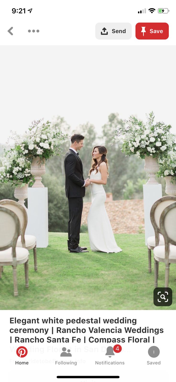 a bride and groom standing in front of chairs