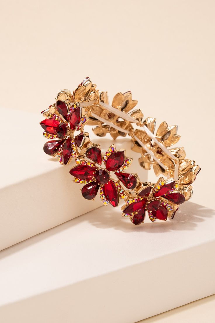 It's all in the details with this gorgeous floral bracelet when every spot hits the light and shines so bright. Petal gems surrounded by colorful rhinestones and a dazzling centerpiece rhinestone are held together by a metal paved setting. A great fashion statement jewelry to add towards your accessory collection. Size Circumference: 7 in (17.8 cm) Height: 1.4 in (3.5 cm) Quality These well designed earrings use an eco-friendly, lightweight, strong black color metal alloy, with top quality brill Real Diamond Necklace, Pearl Shop, Floral Bracelet, Great Fashion, Dope Jewelry, Crystal Accessories, Jewelry Lookbook, Flower Accessories, Pearl Set