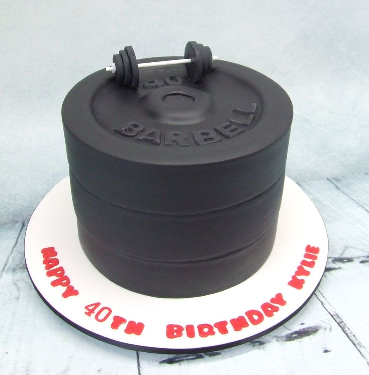 a black and white birthday cake with an iron on top that says happy fortyth birthday