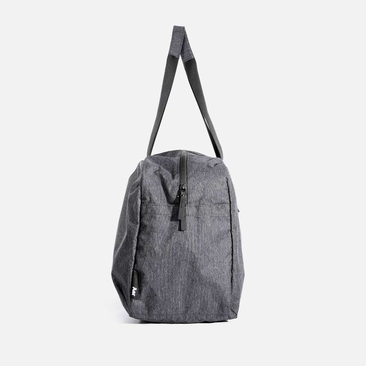 Go Duffel - Heathered Black — Aer | Modern gym bags, travel backpacks and laptop backpacks designed for city travel Modern Gym, Travel Duffel Bag, Travel Backpacks, Gym Bags, Travel Duffel, Duffel Bag Travel, Travel Storage, City Travel, Bags Travel