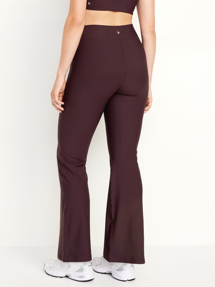 hidden front pocket go-dry wicks moisture extra high waist is 1" higher than standard high rise sits above belly button fitted hip and thigh hits below ankle 31 1/2" regular inseam 29 1/2" petite inseam 35 1/2" tall inseam models are approx.  5'9" and wear sizes s (4), l (12), and xl (18)machine wash according to the care instruction label Flare Leggings, Petite Size, Wicks, Belly Button, Toddler Boys, Front Pocket, Old Navy, High Waist, High Rise