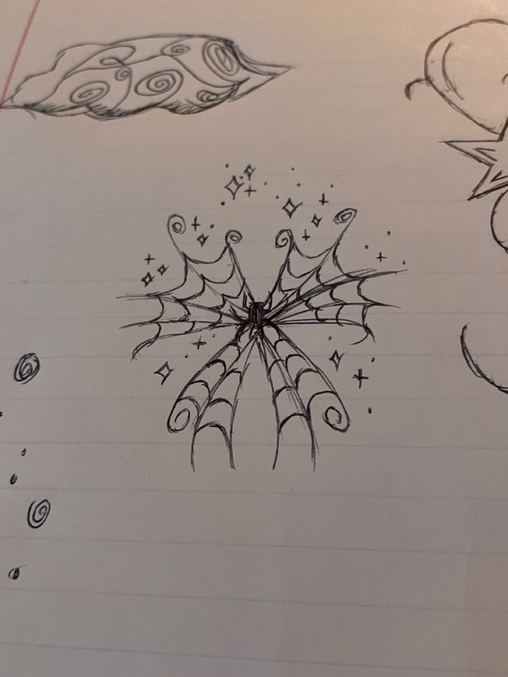 some kind of spider web drawing on a piece of paper