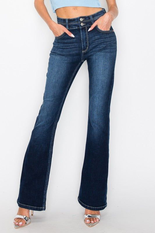 Details Style No. AT1071BTD Step into sophistication and elevate your style with our High Rise Bootcut Jeans, where timeless elegance meets contemporary flair. Crafted to hug your curves in all the right places, these jeans boast a flattering high-rise waistline that elongates the legs and accentuates your silhouette with confidence. Highlights Super Stretchy Denim Comfort High-Quality Material High Rise Chic Regular Hem Dark Stone Wash Shape & fit Bootcut High rise Regular Hem Specifications: F High Rise Medium Wash Fitted Flares, Elegant Medium Wash Denim Bottoms, Fitted Dark Wash Bottoms, Dark Wash Slim Fit Pants For Fall, Slim Fit Dark Wash Pants For Fall, Classic Fitted Dark Wash Flare Jeans, Fall Slim Fit Dark Wash Pants, Medium Wash Fitted Mid-rise Flares, Dark Wash Straight Leg Elastane Bottoms