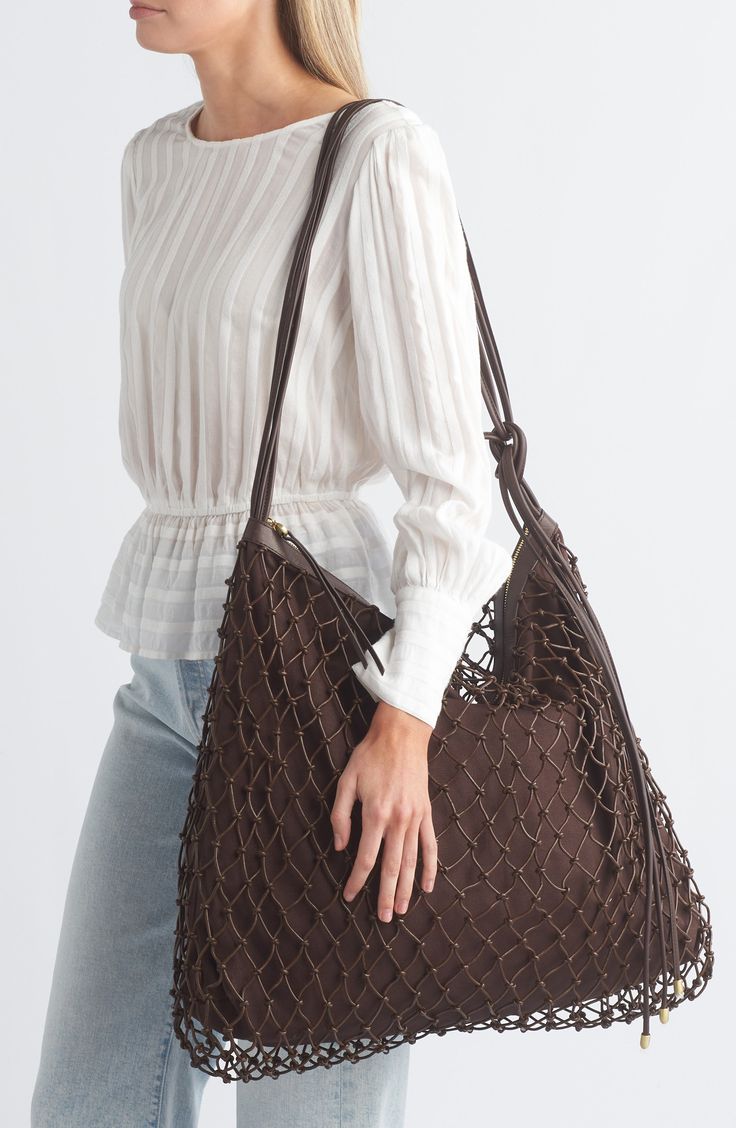 A classic and compact hobo bag designed with woven design and stylish exposed stitching makes it an amazing everyday go-to. 11"W x 9"H x 4"D Top zip closure Textile/leather Imported Brown Hobo Bag With Braided Handles For On-the-go, Brown Woven Leather Shoulder Bag With Double Handle, Versatile Brown Hobo Bag For Shopping, Everyday Woven Leather Shoulder Bag For Fall, Intrecciato Weave Hobo Shoulder Bag For On-the-go, Everyday Fall Woven Leather Shoulder Bag, Brown Woven Leather Shopping Bucket Bag, Brown Woven Leather Hobo Shoulder Bag, Brown Woven Leather Bucket Bag For Shopping