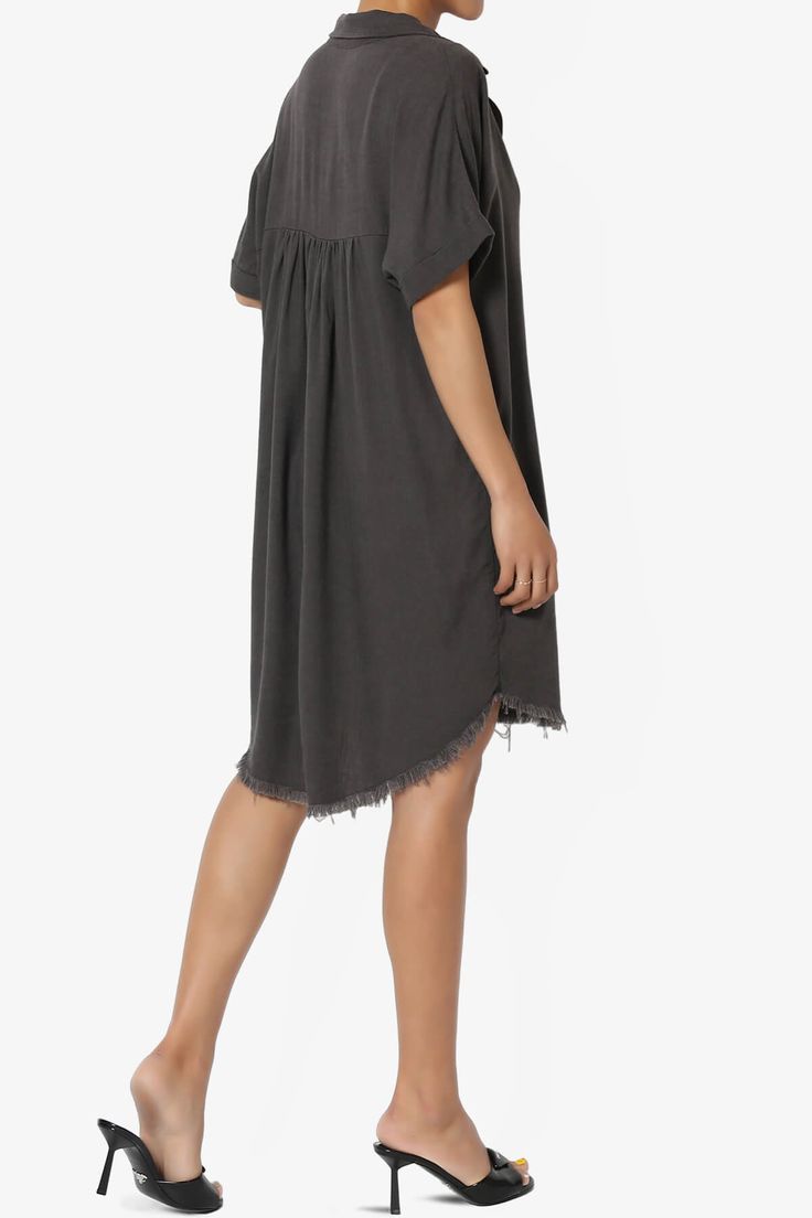 Shirt dresses are a wardrobe staple and we've cast this version in a rayon linen blend. This is a summer dress up or dress down kind of dress and one you'll be wearing during the week and on weekends. Can throw it on with a pair of tennis shoes or dress it up with some cute sandals.Spread collar, Cuffed dolman short sleevesDeep V Neck, Pleated front and back, Frayed hemLightweight, breathable linen blend shirt dressFits true to size, take your normal size, S = Size(4-6), M = Size(8-10), L = Size Flowy Short Sleeve Shirt Dress For Daywear, Chic Rayon Tunic For Summer, Casual Cotton Midi Dress For Daywear, Casual Rayon Shirt Dress For Summer, Flowy Short Sleeve Shirt Dress For Summer, Flowy Short Sleeve Shirt Dress, Summer Beach Shift Linen Dress, Casual Viscose Tunic Dress, Chic Cotton Tunic With Short Sleeves