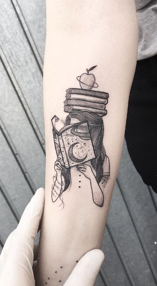 a woman's arm with an apple on top of books and a clock tattoo