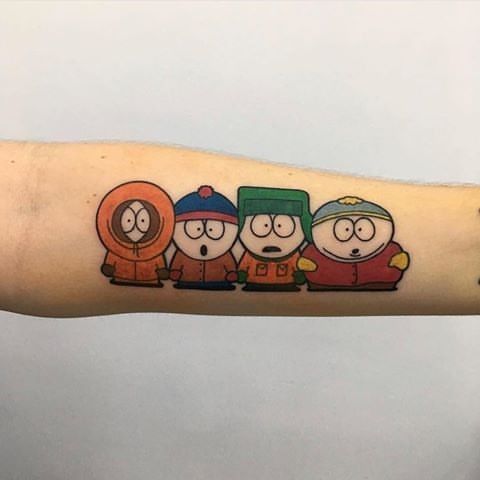 a person with a cartoon tattoo on their arm