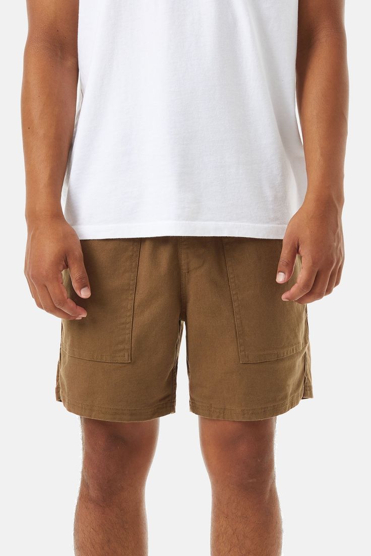 Inspired by one of our original 1970's walk-short designs, the Trails Short is a new addition to our walk-short collection. Made from a durable 98% cotton canvas 2% spandex canvas fabric, the Trails Short has a 16.5" outseam and features as elastic cinched waistband, front patch pocket, back welt pockets, notched side seam hem, faux fly and internal diagonal pinstripe binding. 98% cotton 2% spandex fabric Front patch pockets Back welt pockets Faux fly Notched side seam hem Internal pinstripe bin High-waisted Cargo Shorts With Hip Pockets For Summer, Fitted Cotton Shorts With Pockets, Fitted Cotton Cargo Shorts With Pockets, Fitted Cotton Shorts With Side Pockets, Short Cotton Bottoms With Patch Pockets, Cotton Bottoms With Side Pockets In Short Length, Fitted Shorts With Patch Pockets, Casual Brown Cotton Shorts, Summer Brown Bottoms With Hip Pockets