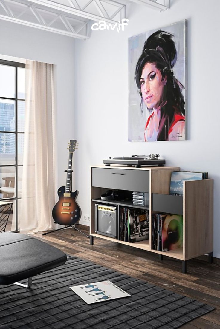 a living room with an entertainment center and guitar