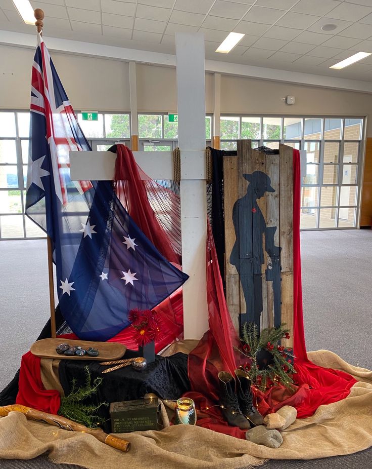 an assortment of flags and decorations on the floor