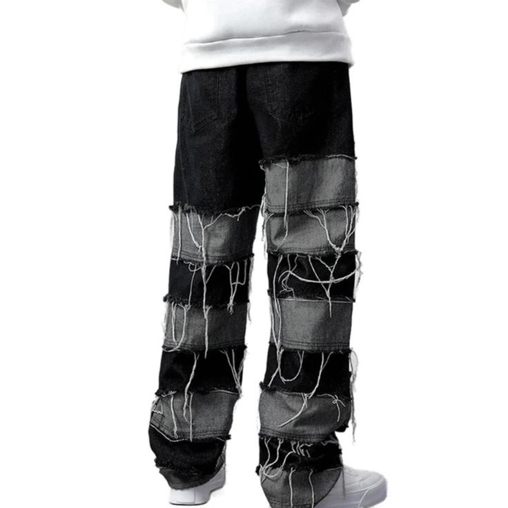 Introducing the latest trend in streetwear fashion - the Hip Hop Stripe Panel Jeans. These jeans are designed to make a statement with their bold and eye-catching stripe panels. Made from high-quality denim, these jeans are not only stylish but also durable and comfortable to wear. The unique design of these jeans features a slim fit with a mid-rise waist and a tapered leg. The stripe panels, available in a variety of colors, add a touch of urban flair to the classic denim look. Whether you're hitting the streets or heading to a concert, these jeans will elevate your style game. Modern Black Denim Jeans, Hip Hop Cotton Jeans For Winter, Cotton Hip Hop Jeans For Winter, Hip Hop Winter Cotton Jeans, Trendy Patchwork Bottoms For Streetwear, Black Pants With Contrast Stripes For Streetwear, Striped Straight Leg Pants For Streetwear, Edgy Streetwear Jeans For Winter, Black Hip Hop Jeans For Spring