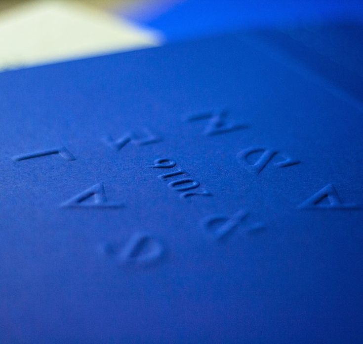 a blue folder with writing on it