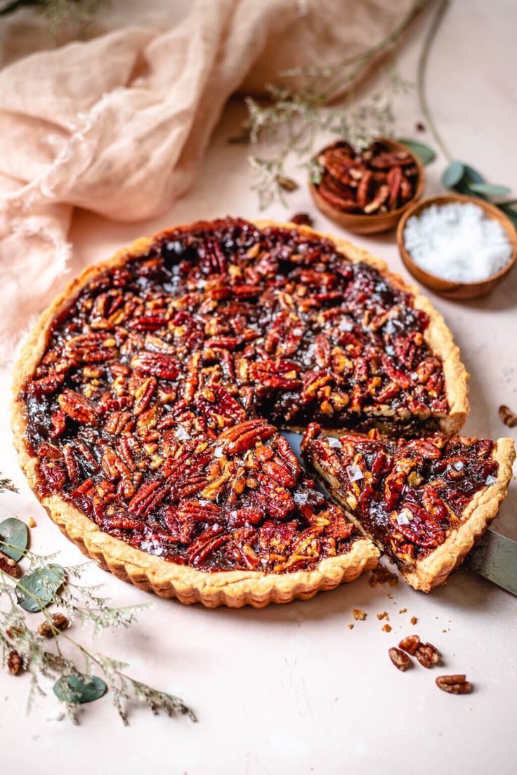 a pecan pie with one slice taken out