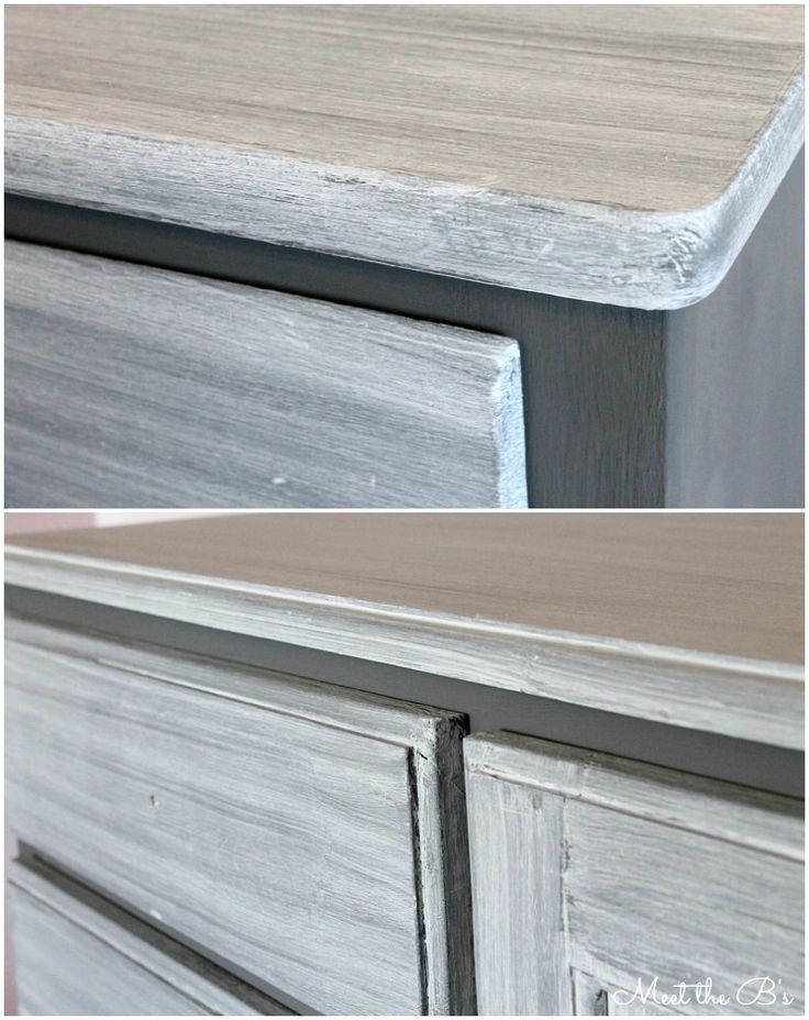 an old dresser has been painted white and gray