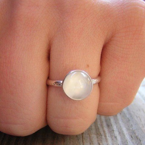 Natural Opaque Natural Moonstone Ring 10mm Round White Moonstone Cabochon 925 Argentium Silver Recycled and Eco Friendly Silver and conflict free gemstone Band width 2.25, Side profile Height depends on the height of the cabochon, but typically the stone is very low profile. Gemstone Solitaire Ring, Moonstone Ring Sterling Silver, White Moonstone, Silver Stacking Rings, Argentium Silver, Moonstone Jewelry, Moissanite Wedding Bands, Put A Ring On It, Silver Band Ring