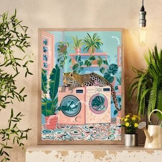 a painting on the wall next to a potted plant and an old washer