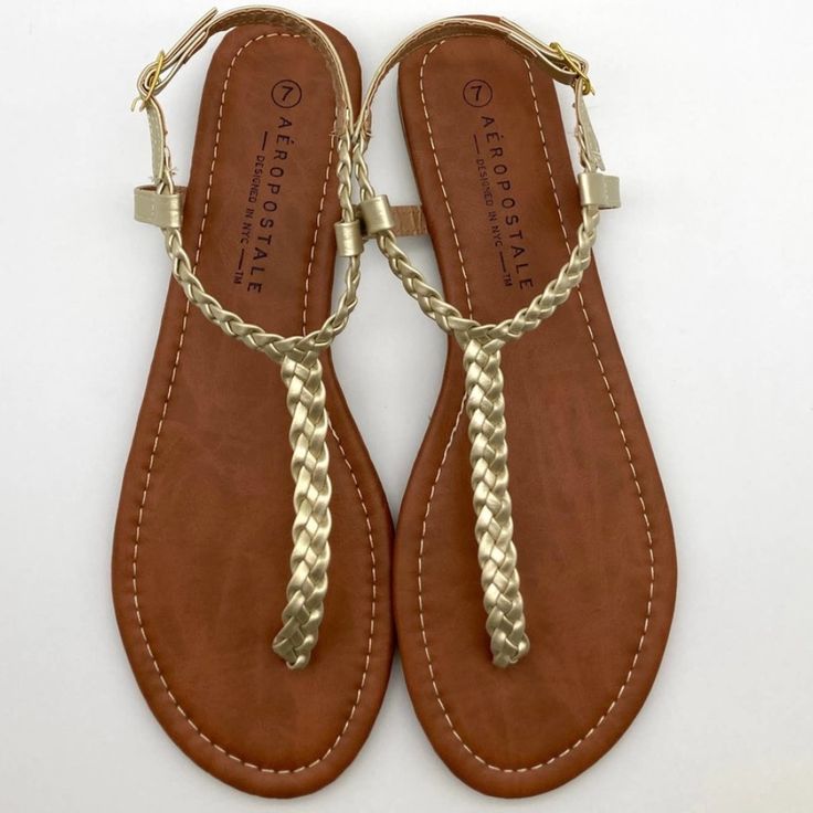 Brand New With Tags Casual Gold Flip Flops For Spring, Gold Flat Casual Flip Flops, Casual Gold Adjustable Sandals, Casual Gold Sandals With Adjustable Fit, Casual Gold Flip Flops For Beach Season, Casual Gold Flip Flops For Beach, Gold Casual Sandals For Beach Season, Casual Gold Sandals For Beach Season, Gold Braided Straps Sandals For Beach