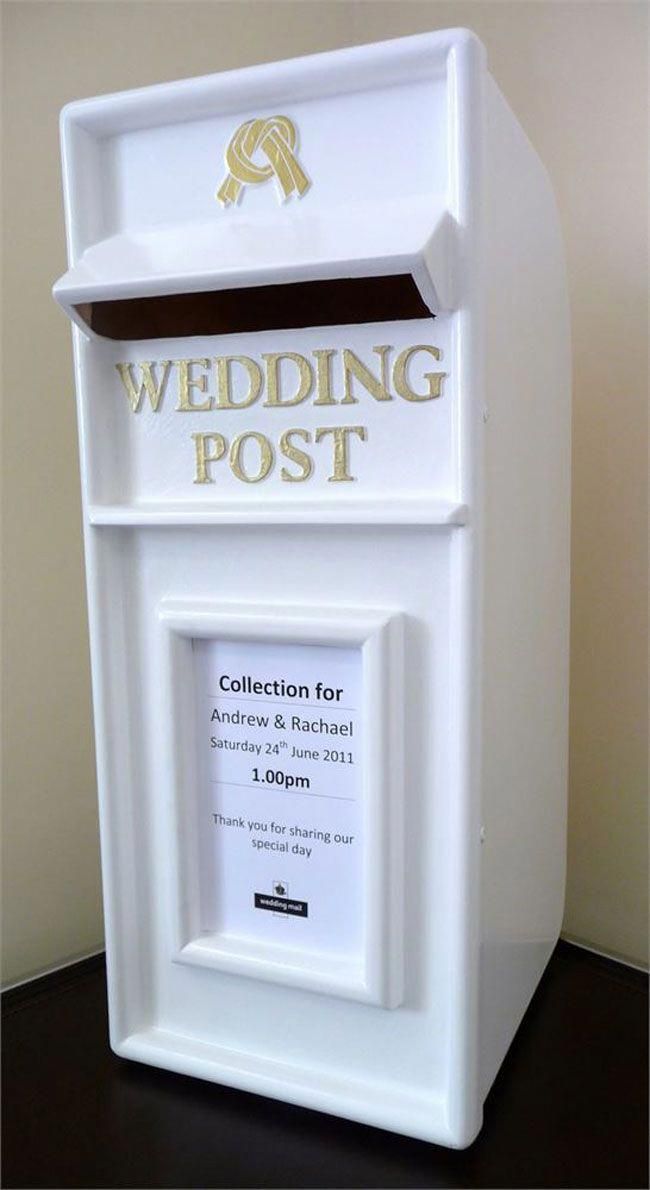 the wedding post box is white with gold lettering