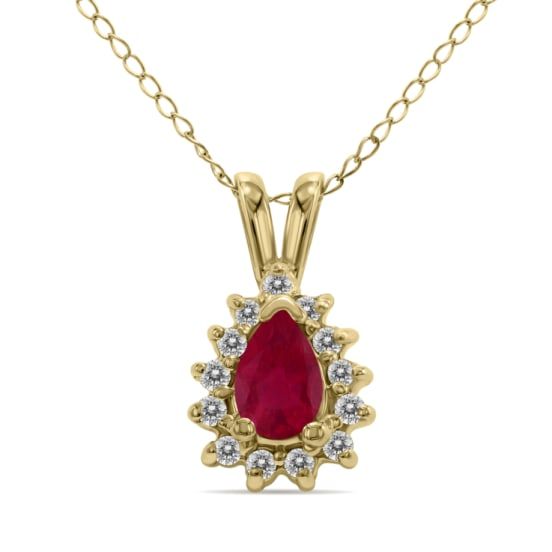 This majestic teardrop ruby necklace with a naturally mined diamond is truly a sight to behold. Nestled in smooth 14K yellow gold, this piece features a hand-selected round diamond that will turn heads no matter the occasion. This simple yet sophisticated pendant rests on a sturdy 18-inch yellow gold chain that is secured by a spring ring clasp. The expert craftsmanship and quality of this natural gemstone and diamonds make this piece a one-of-a-kind creation. This is the piece for you if you ar Pear-shaped Diamond Birthstone Necklace, Red Diamond Teardrop Necklace, Red Teardrop Diamond Necklace, Yellow Gold Teardrop Diamond Necklace With Prong Setting, Yellow Gold Pear-shaped Diamond Necklace With Gemstone, Red Diamond Teardrop Pendant Necklace, Yellow Gold Ruby Teardrop Necklace, Yellow Gold Teardrop Ruby Necklace, Fine Jewelry Ruby Necklace In Pear Shape