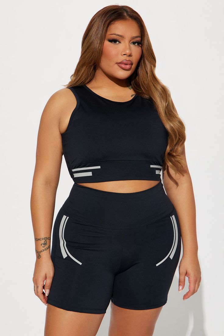 Available In Black. Active Top Scoop Neck Sleeveless Padded Cropped Active Biker Short High Waisted, Elastic Waistband Elevate Reflective Detail High Performance Stretch Body: 73% Polyester 27% Spandex Inner Mesh: 82% Nylon 18% Spandex Imported | Sprint Reflective Elevate Active Set in Black size XS by Fashion Nova Black Seamless Tank Activewear, Sleeveless Gym Crop Top With Built-in Bra, Black Activewear Crop Top With Built-in Bra, Black Crop Top Activewear With Built-in Bra, Black Stretch Tank Sports Bra, Sleeveless Black Seamless Activewear, Black Seamless Construction Crop Top Activewear, Black Sleeveless Sports Bra For Athleisure, Black Seamless Crop Top Activewear