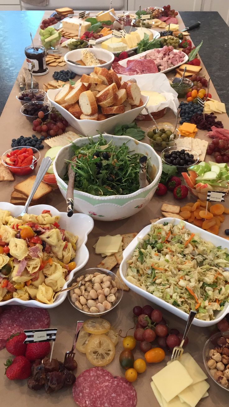 a table filled with lots of different types of food