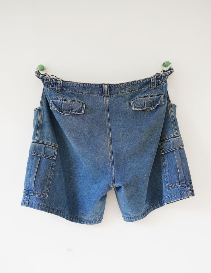 Vintage cargo shorts w/ adjustable silver hardware Waist 46 Utility Jean Shorts With Multiple Pockets, Utility Denim Shorts With Multiple Pockets, Utility Style Medium Wash Jean Shorts, High Rise Denim Cargo Shorts With Pockets, High Rise Denim Cargo Shorts, Utility Denim Jean Shorts, Utility Jean Shorts With Hip Pockets, Denim Blue Cargo Pocket Jean Shorts, Utility Denim Shorts With Pockets