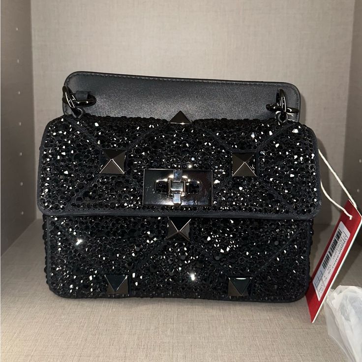 Authentic! Brand New Valentino Garavani Roman Stud Crystals Black. Size Small. Comes With Chain, Dust Bag, And Box. Black Shoulder Flap Bag For Party, Luxury Shoulder Bag For Events, Luxury Embellished Shoulder Bag For Party, Black Party Shoulder Flap Bag, Designer Crossbody Evening Bag, Luxury Party Bag With Removable Pouch, Luxury Clutch Shoulder Bag For Night Out, Designer Clutch Shoulder Bag For Events, Luxury Shoulder Bag With Detachable Strap For Party