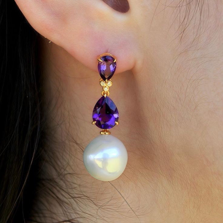 Divina 14K Real Gold Diamond Amethyst Double Purple Gemstones Round Baroque Pearls Convertible Earrings Ear Stud *Metal: 14K Solid Gold ( Au585 stamped, not gold-filled or plated ) *Gemstone:    - Type: Natural Amethyst    - Cut: Pear-Cut   - Color: Purple   - Clarity: Eye-Clean    - Size:  7 x 9 mm, 5 x 7 mm   - Total Carat Weight (CTW): 4.00 *Pearls:   - Type: Round Baroque Pearls   - Size: Approximately 12 - 13 mm *Diamonds:    - Color: G    - Clarity: VS    - Total Carat Weight (CTW): 0.03 * Elegant Amethyst Earrings As A Gift, Elegant Amethyst Earrings, Elegant Purple Pear Shaped Jewelry, Elegant Purple Pearl Earrings For Formal Occasions, Purple Pear-shaped Elegant Jewelry, Formal Purple Pearl Drop Earrings, Elegant Purple Pearl Earrings For Anniversary, Elegant Amethyst Earrings With Pearl Drop, Elegant Purple Pearl Earrings