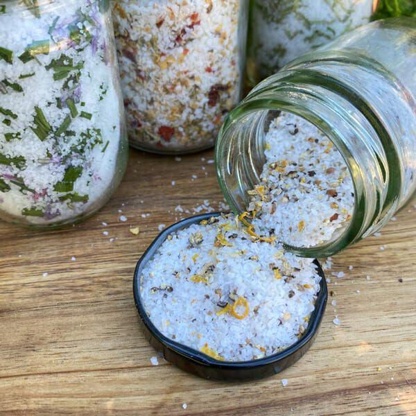 several jars filled with different types of food