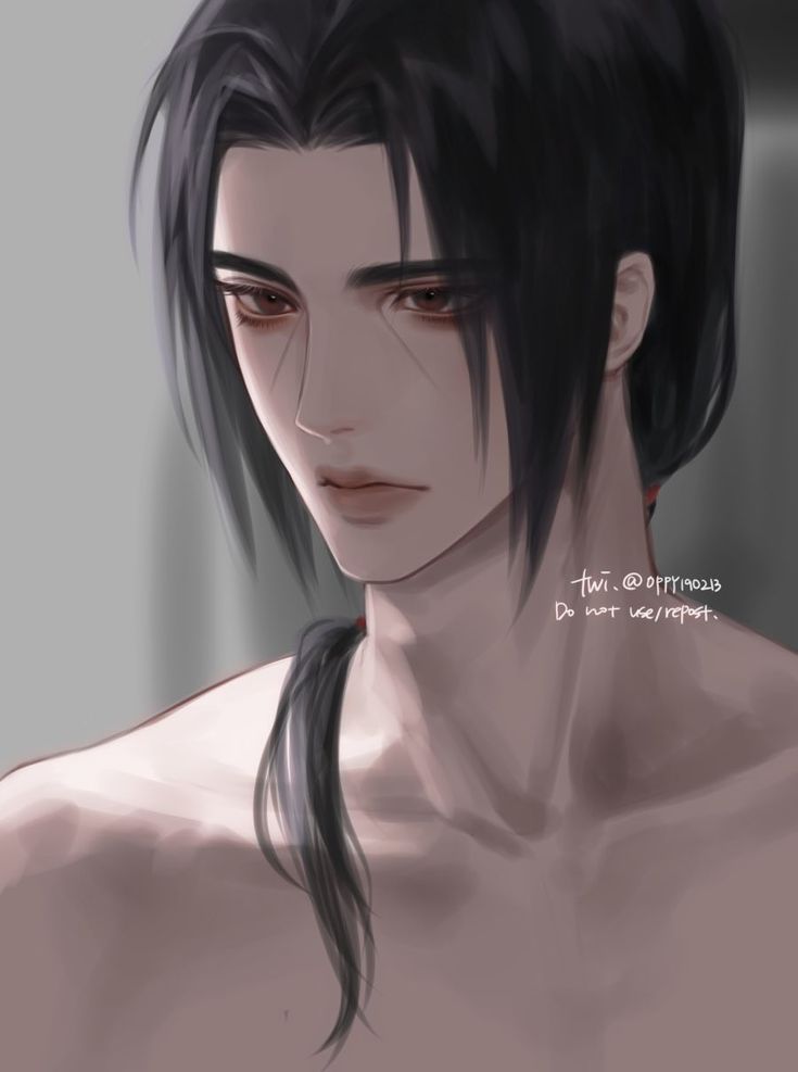 a man with long black hair and no shirt