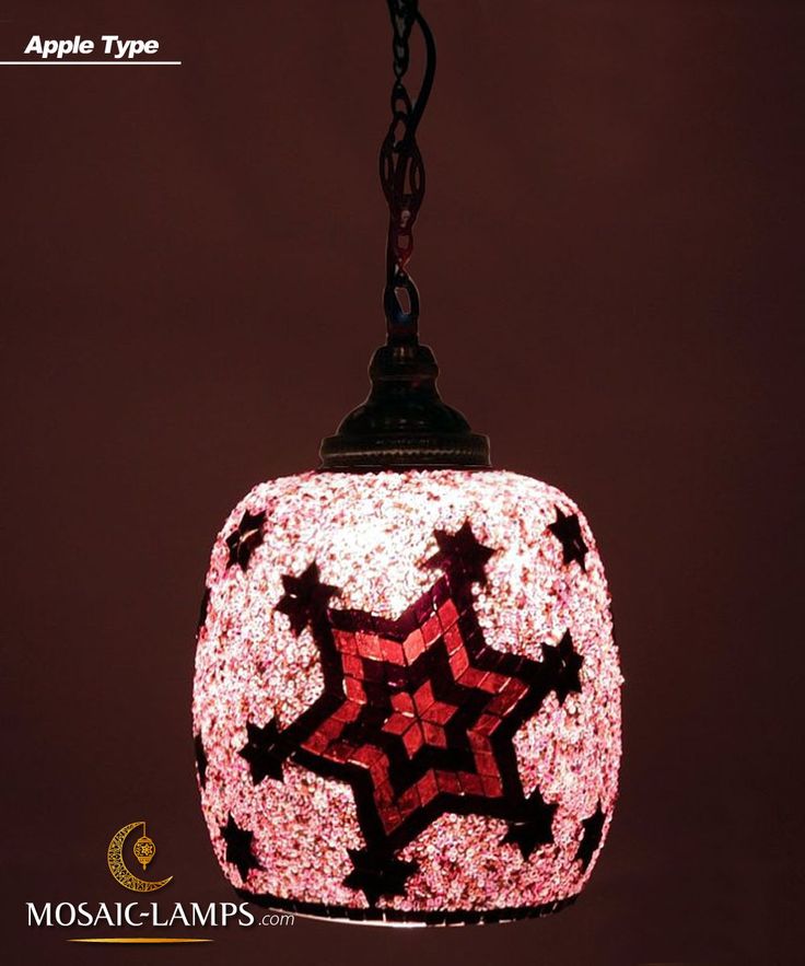 a red and black mosaic lamp hanging from a chain on a dark background with the words mosaic - lamps written below it