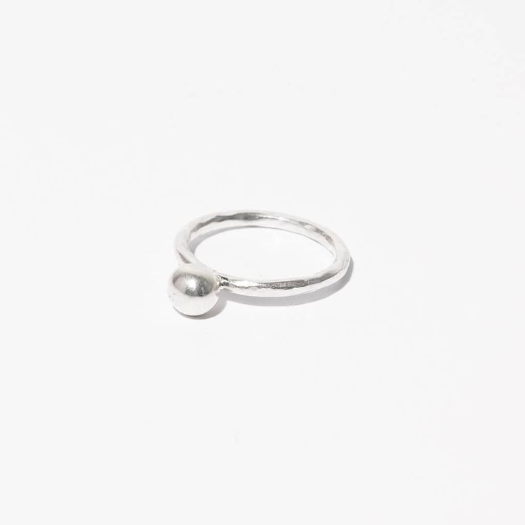 Simple Orb Droplet Ring in Sterling Silver by Mulxiply Simple Adjustable Stackable Rings, Minimalist Sterling Silver Teardrop Rings, Dainty Teardrop Adjustable Rings, Simple Adjustable Round Band Ring, Minimalist Teardrop Ring For Everyday, Simple Adjustable Band Ring, Simple Adjustable Round Band Jewelry, Teardrop Stackable Adjustable Rings, Adjustable Minimalist Dome Ring With Round Band